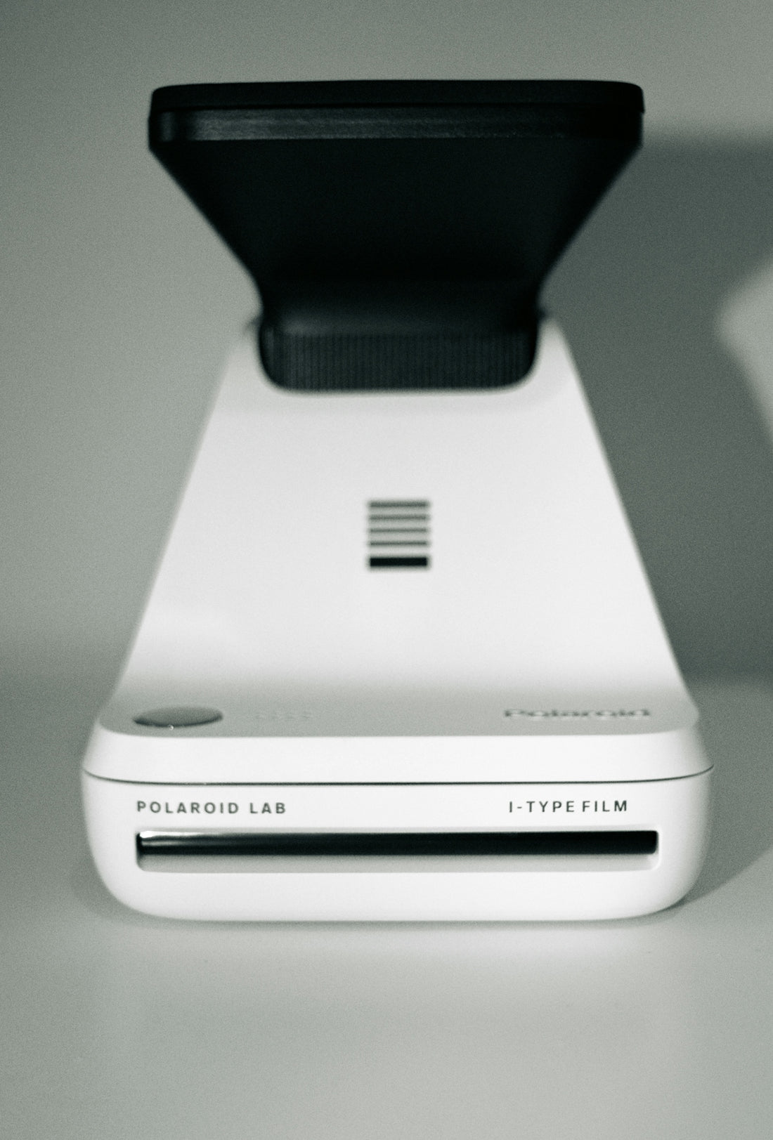 a close up of a cell phone on a table