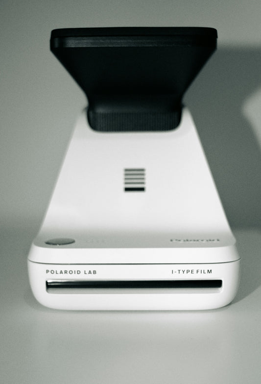 a close up of a cell phone on a table